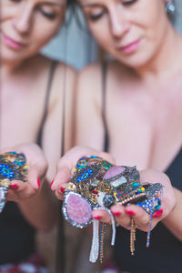 Close-up of woman holding hands