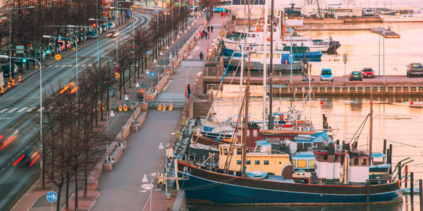 Boats moored at harbor