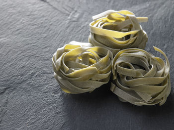 Close-up of pasta on slate