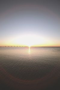 Scenic view of sea at sunset