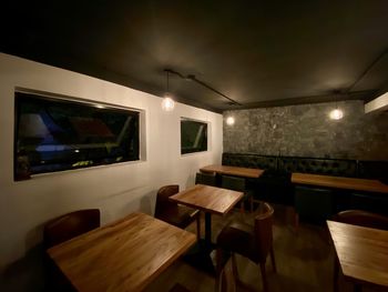 Empty chairs and table in restaurant