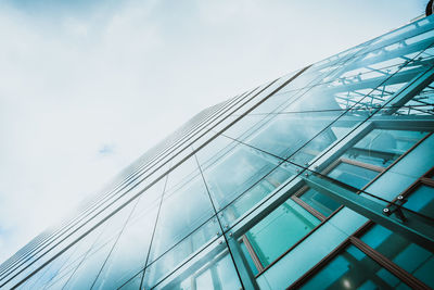 Low angle view of modern building against sky