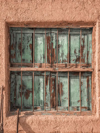 Closed window of old building