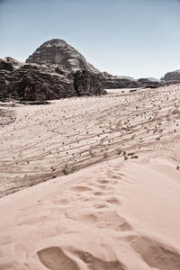 Scenic view of desert against clear sky