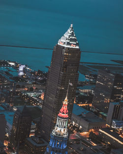 Aerial view of illuminated buildings in city