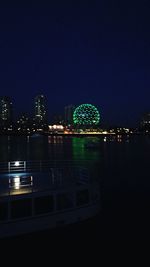 Illuminated cityscape at night