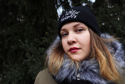 Portrait of young woman with eyes closed