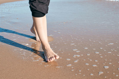 Low section of man on beach