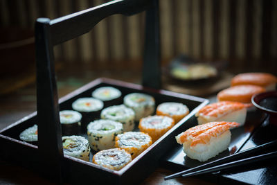 Close-up of sushi in plates on table