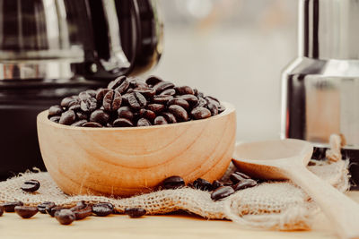 Close-up of coffee beans on table