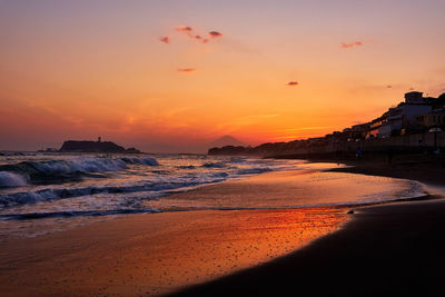 Scenic view of sea against sky during sunset