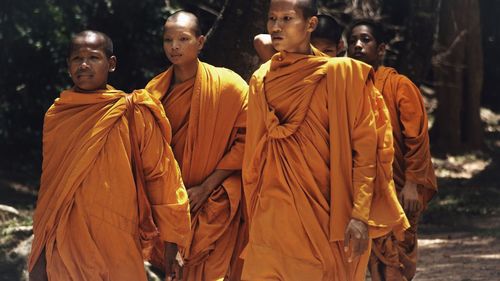 Close-up of men standing outdoors