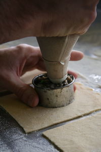 Close-up of person hand holding fork