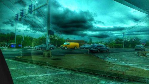 View of city against cloudy sky