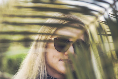 Portrait of young woman in sunglasses