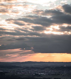 Scenic view of dramatic sky over land