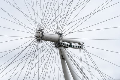 Low angle view of ferris wheel against sky