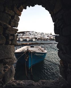 Sea seen through arch of building