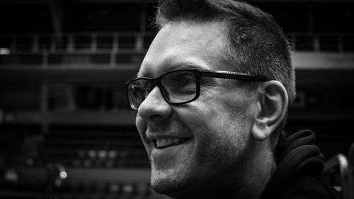 Close-up portrait of man wearing eyeglasses