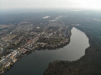 High angle view of river amidst buildings in city