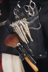 Close-up of tools in pouch