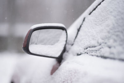 Close-up of car on snow