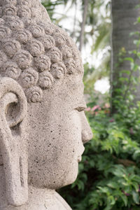 Close-up of statue in cemetery