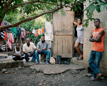 People for sale at market stall