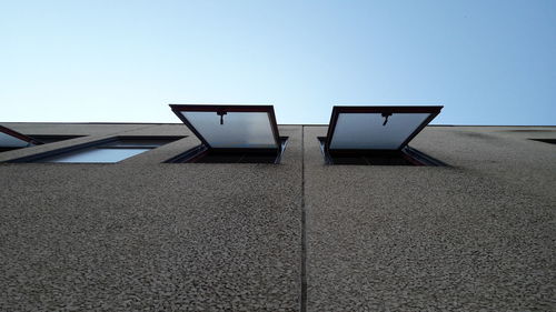 Low angle view of house against clear sky