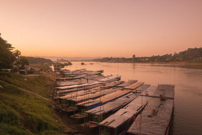 High angle view of river against clear sky during sunset