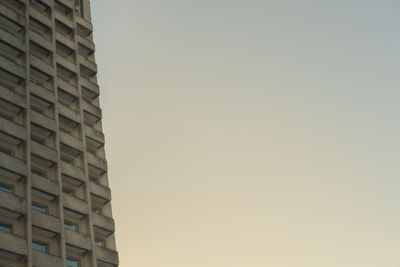 Low angle view of buildings against clear sky