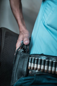 Close-up of man holding hands