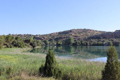 Scenic view of lake against clear sky