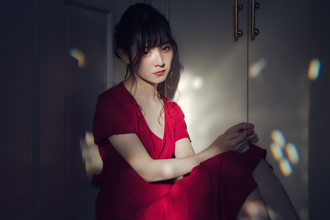 one person, adult, women, young adult, red, indoors, portrait, anime, fashion, photo shoot, female, hairstyle, clothing, waist up, arts culture and entertainment, standing, black hair, looking, lifestyles, person, night, dress, business, looking at camera