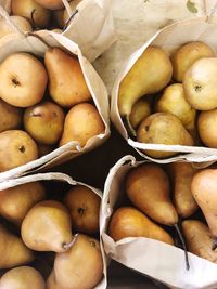 High angle view of pears for sale at market stall