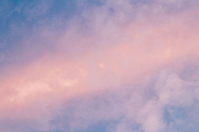 Low angle view of cloudy sky during sunset