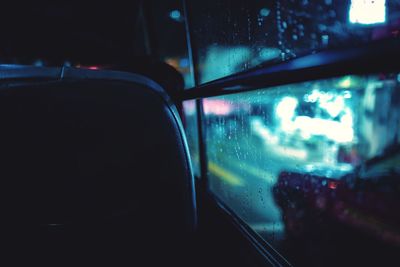 Close-up of wet glass window in rainy season