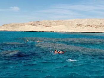 Man swimming in sea