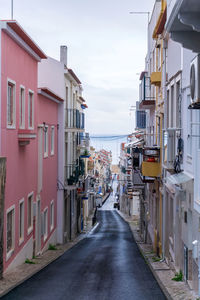 An empty old street leading to the ocean, in the historic center of the portuguese city of nazare