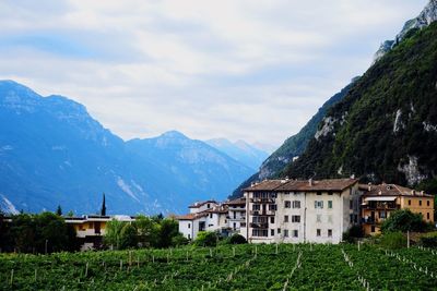 Scenic view of mountains against cloudy sky