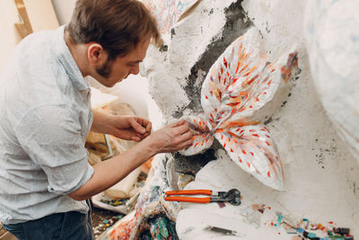 High angle view of artist working outdoors