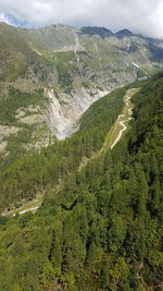 High angle view of green landscape against sky