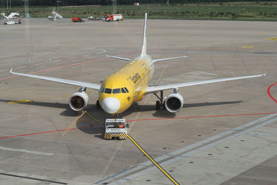 High angle view of airplane on runway