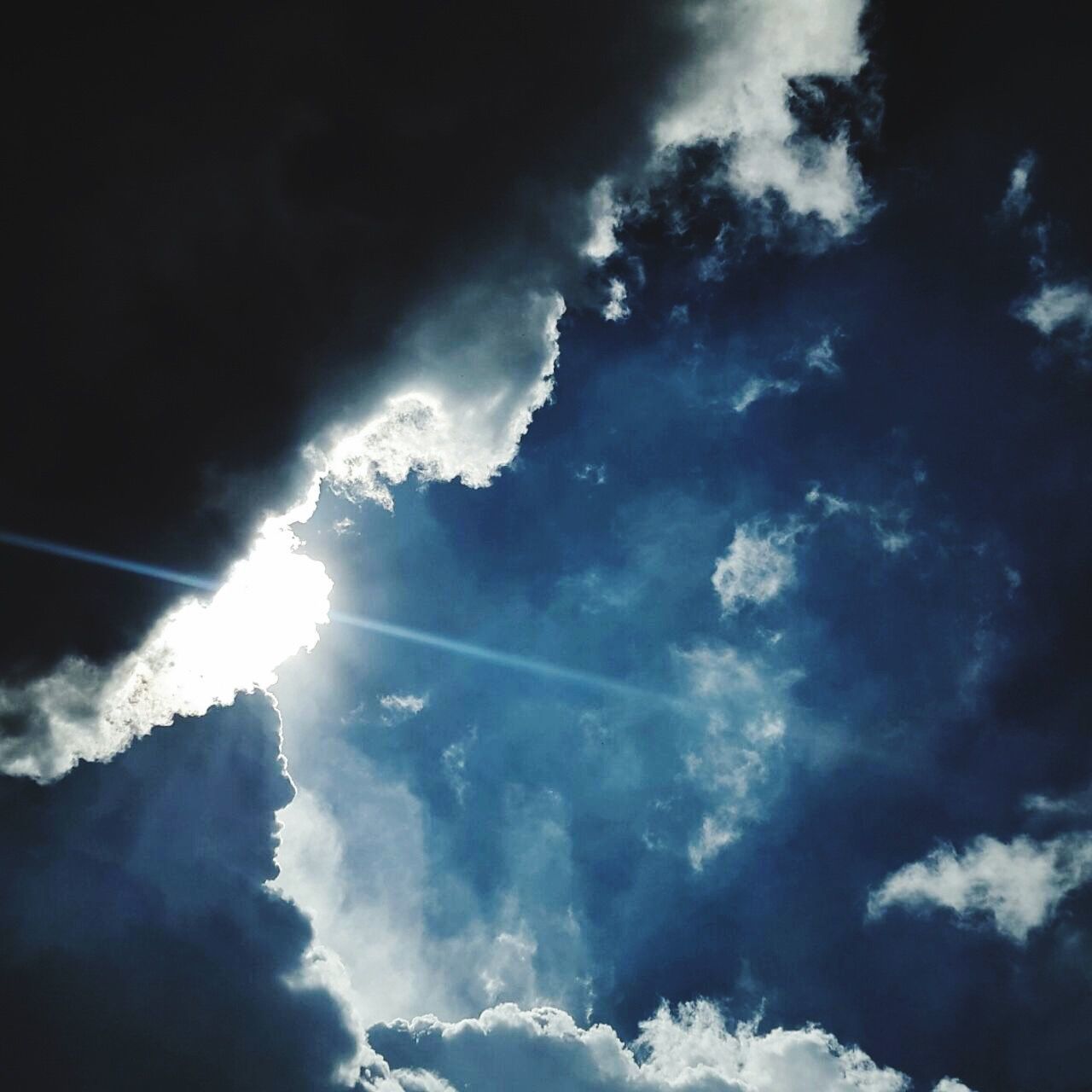 sky, cloud - sky, cloudy, weather, scenics, beauty in nature, tranquility, tranquil scene, low angle view, nature, storm cloud, cloud, overcast, cloudscape, idyllic, dramatic sky, atmospheric mood, outdoors, no people, majestic