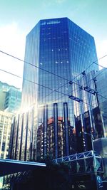 Low angle view of modern buildings against sky