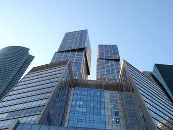 Low angle view of modern building against clear sky