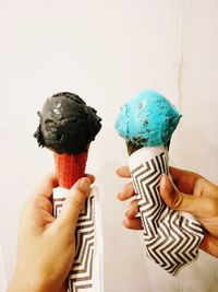 Midsection of person holding ice cream