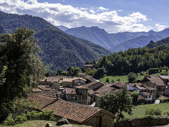 High angle view of townscape against mountains