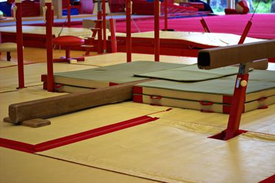 Close-up of empty chairs on table