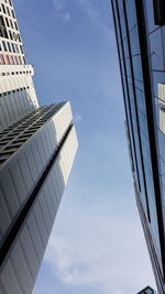 Low angle view of modern buildings against sky